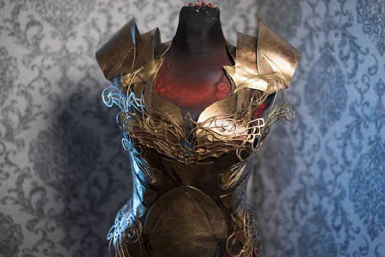 Knight Armor of woman Strong metal breastplate handmade in gold with gothic shapes and fine steel strands