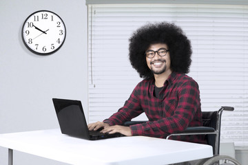 Handicap businessman smiling at camera