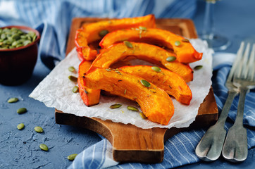 Rosemary honey roasted pumpkin wedges with pumpkin seeds