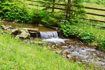 A small waterfall on a mountain stream