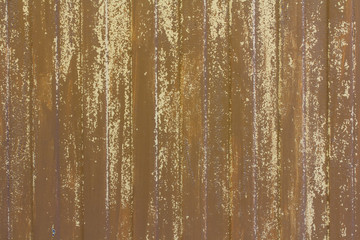 Texture of old sheet metal with worn brown paint