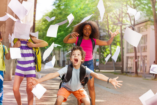 Very Excited Boy Scream With Friends Throws Paper