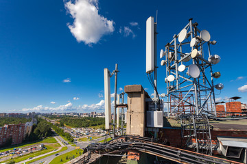 Telecommunication tower with wireless communications systems are including microwave, panel...