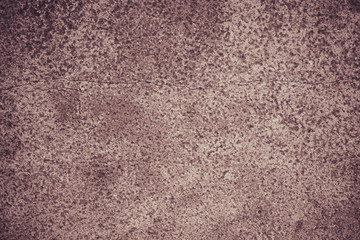 Old concrete wall with cracks - vintage grunge toned background, texture