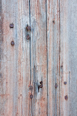 Texture of old wood with distressed paint in various colors