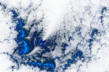 Blue Fractal floral background with a lot of curls