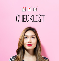 Checklist text with young woman on a pink background