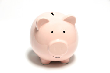 close up on piggy bank isolated on white background