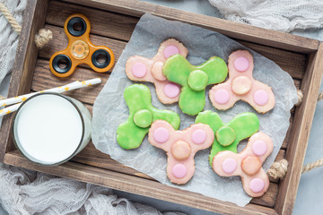 Homemade shortbread cookies made in trendy spinner toy form, top view