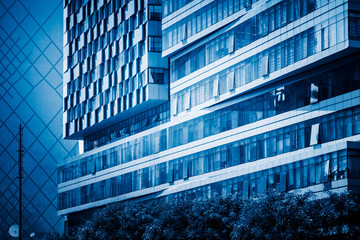 Obraz premium detail shot of modern architecture facade,business concepts,in city of China.