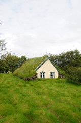 Fototapeta na wymiar Hofskirkja church is a beautiful turf church in South-East Iceland.
