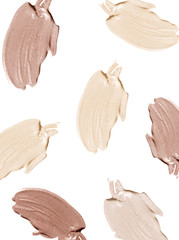 Liquid makeup foundations/blush on white background