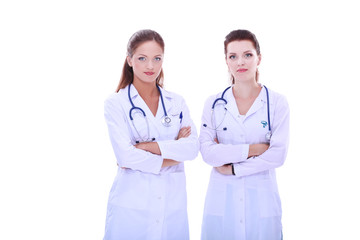 Two young woman doctor , standing in hospital.