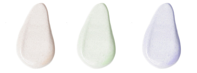Face cream samples on white background