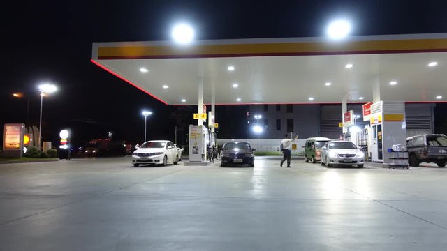 Time lapse. Gas Fuel station with vehcle and service operator