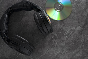 Black Wireless Headphone with Compact Disk