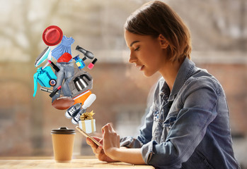 Young woman sitting in cafe with coffee
