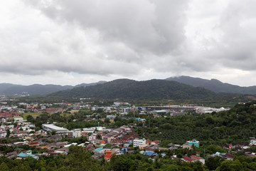 storm clouds over city in phuket thailand