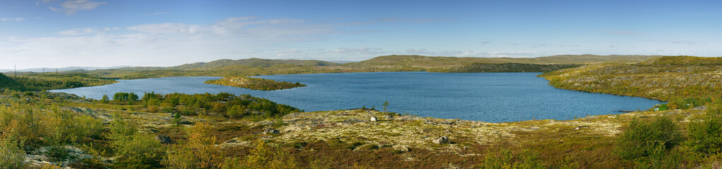 The lake is among the hills. The Kola Peninsula.