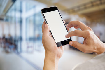 Businessman using Smartphone. Blank screen mobile phone for graphic display montage.