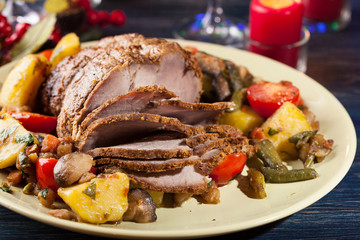 Juicy roast pork on the holiday table
