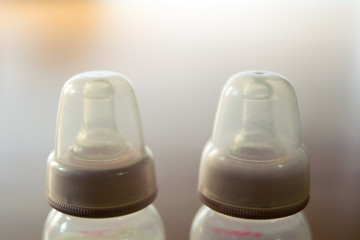 close up bottle of baby milk