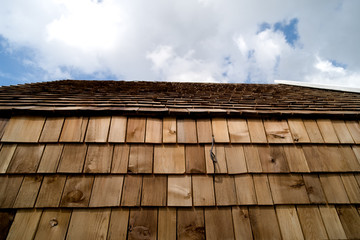 Wooden roof on blue sky