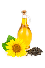 Sunflower oil, seeds and flower isolated on white background