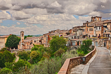 Fototapeta na wymiar Colle di Val d' Elsa, Siena, Tuscany, Italy: landscape of the medieval town, ancient village on the hill surrounded by countryside