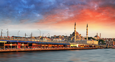 Istanbul at sunset with mosque and bridge