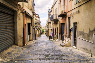 Fototapeta na wymiar Street of sicilian town of interior