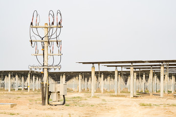 electric pole power lines in solar farm