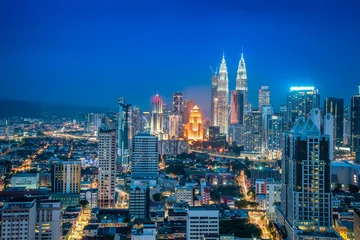 Gordijnen Beautiful cityscape of night scene sky at Kuala Lumpur city skyline, Malaysia © sakarin14
