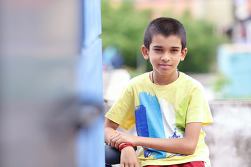 Portrait of Indian Boy Posing to Camera