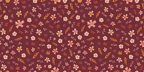 Wall murals Bordeaux Seamless ditsy floral pattern in autumn color palette of maroon, orange, pink and golden yellow.  All over flower print.