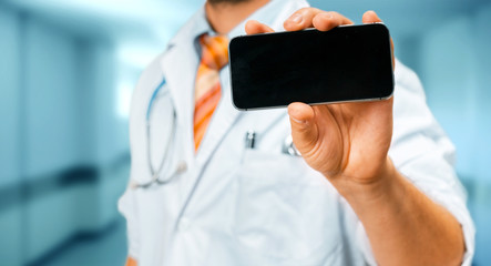Technology in Health and Medicine Concept. Doctor With Smartphone Copy-Space