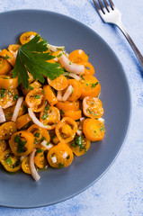 Salad of yellow tomato