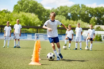Outdoor kussens Junior Football Player at Practice © Seventyfour