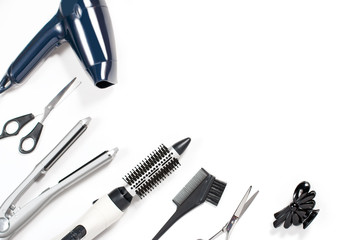Various hair styling tools on white background