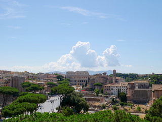 Beautiful clouds above coliseum, view of the Colosseum and the Roman Forum, Rome, Italy.