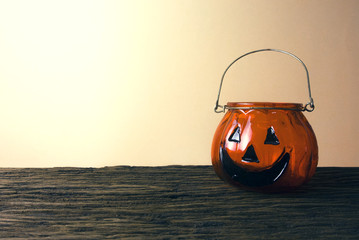 halloween pumpkin pot on wood table