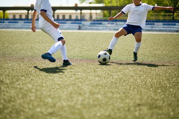 Obraz premium Boys Playing Football