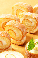 Slices of cream Swiss roll