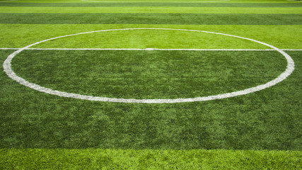 Fototapeta premium Green grass center of soccer or football field background