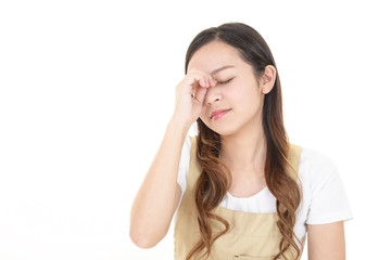 頭痛を訴える女性