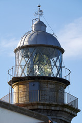 Maritim lighthouse backgrounded with blue sky