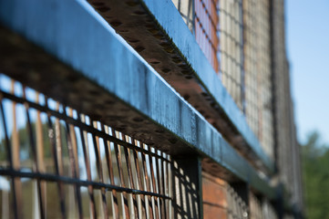 Side view of metal fencing