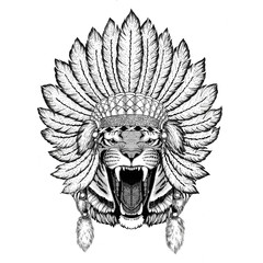 Wild tiger Wild animal wearing indiat hat with feathers Boho style vintage engraving illustration Image for tattoo, logo, badge, emblem, poster