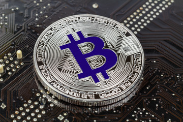 Silver bitcoin on the black background closeup. Cryptocurrency virtual money