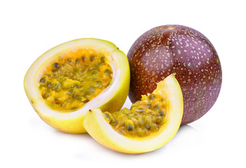 whole and half of passion fruit isolated on white background